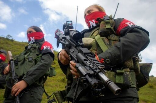 National Liberation Army ELN rebels of the Manuel Vazquez Castano northeastern war front  stand guard at Catatumbo region, Colombia on March 8, 2025.