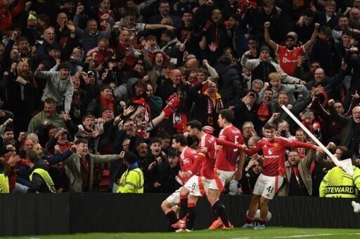 Manchester United celebrate after completing their comeback against Lyon in the Europa League quarter-finals