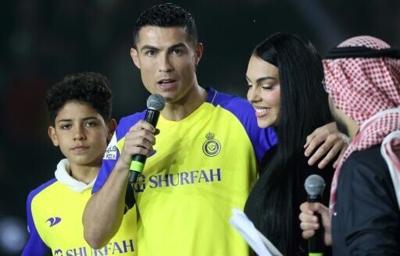 Portuguese forward Cristiano Ronaldo (C-L), his partner Georgina Rodriguez (C-R) and son Cristiano Ronaldo Jr in the Saudi capital Riyadh on January 3, 2023