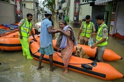 Residents were rescued by boats from flooded areas of Bengaluru