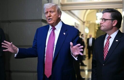 Donald Trump and Speaker of the House Mike Johnson speak to the press after a House GOP Conference Meeting at the US Capitol in Washington, DC on May 20, 2025