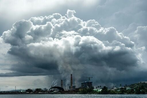 Smelter towers at the Weda Bay Industrial Park belch a cloud that hovers over Halmahera
